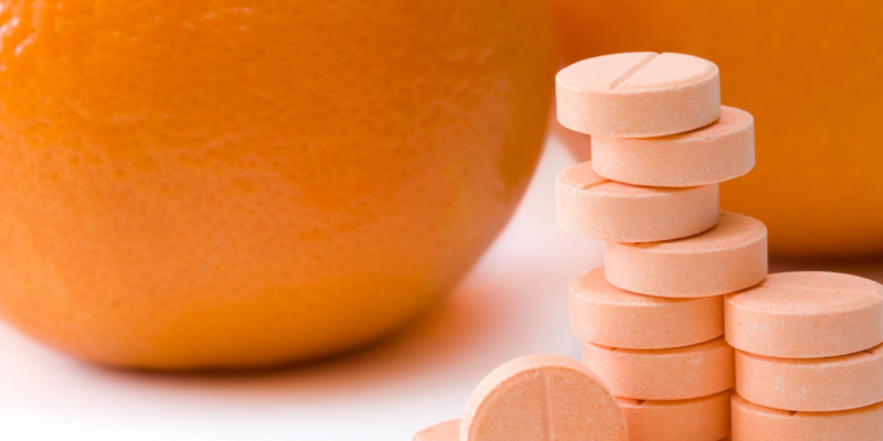 Vitamin C, pills, pill bottle, cold medicine, pet poisons, pet toxins, flu season, cold season, human medications, toxic to pets, pills, Advil, Alieve, Dayquil, Nyquil, Claritin-D, Tylenol, ibuprofen