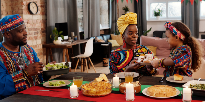 family, feast, eating, Kwanzaa pet dangers, Kwanzaa pet hazards, Kwanzaa pet gifts, Animal Emergency & Referral Center of Minnesota, Twin Cities emergency vet, Saint Paul emergency vet, Oakdale emergency vet, pet toxins, pet hazards, pet dangers