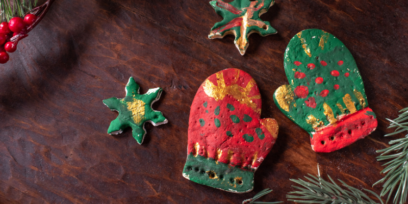 homemade salt dough ornament mittens with paintings, holiday pet toxins, Animal Emergency & Referral Center of Minnesota