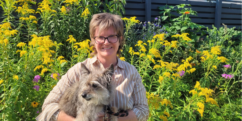 Heidi Brenegan, Chief Marketing Officer at Animal Emergency & Referral Center of Minnesota with her dog, Sally, who was recently diagnosed with cancer.