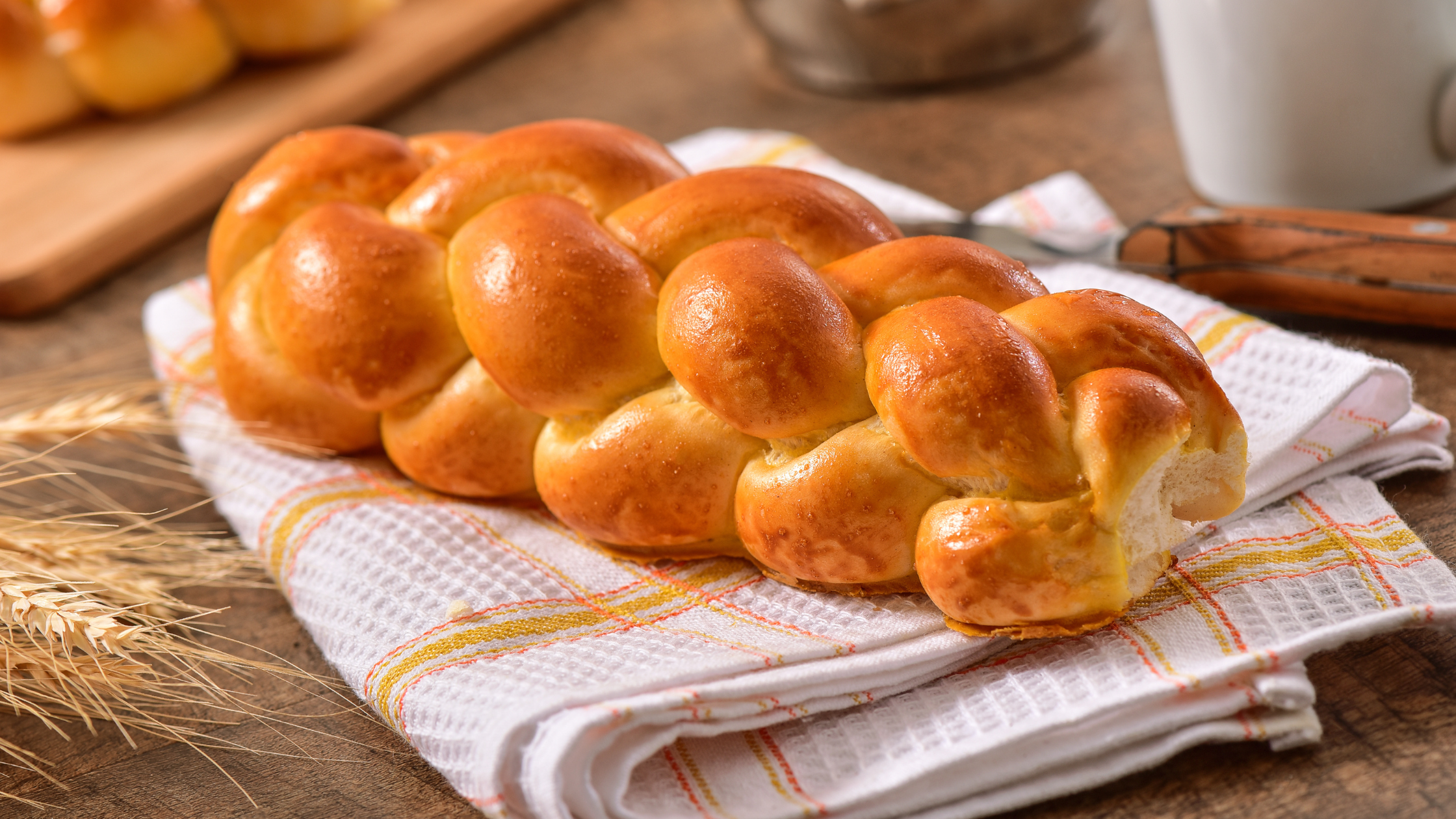 Baked challah on a table.