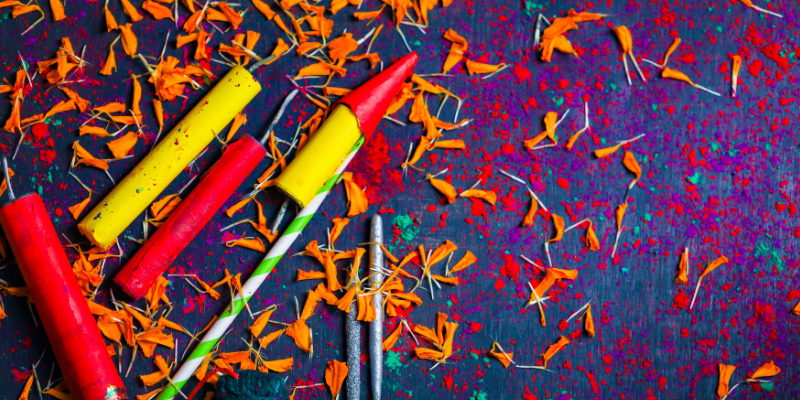 Confetti poppers on top of confetti. 