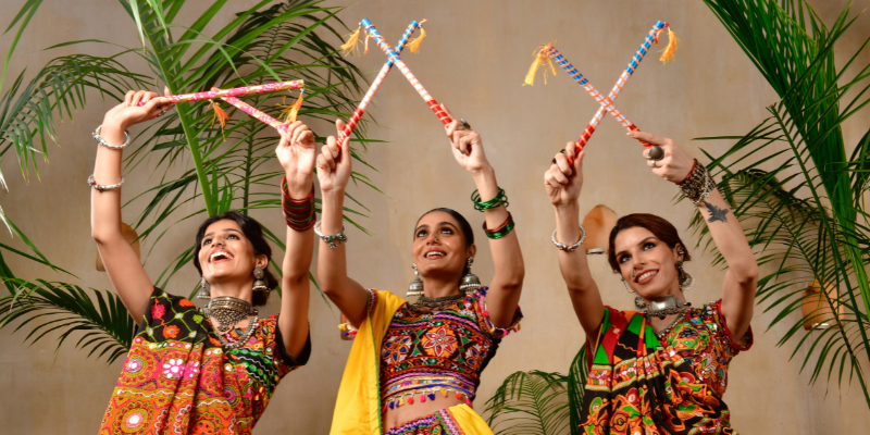 Three woman celebrating Navratri.